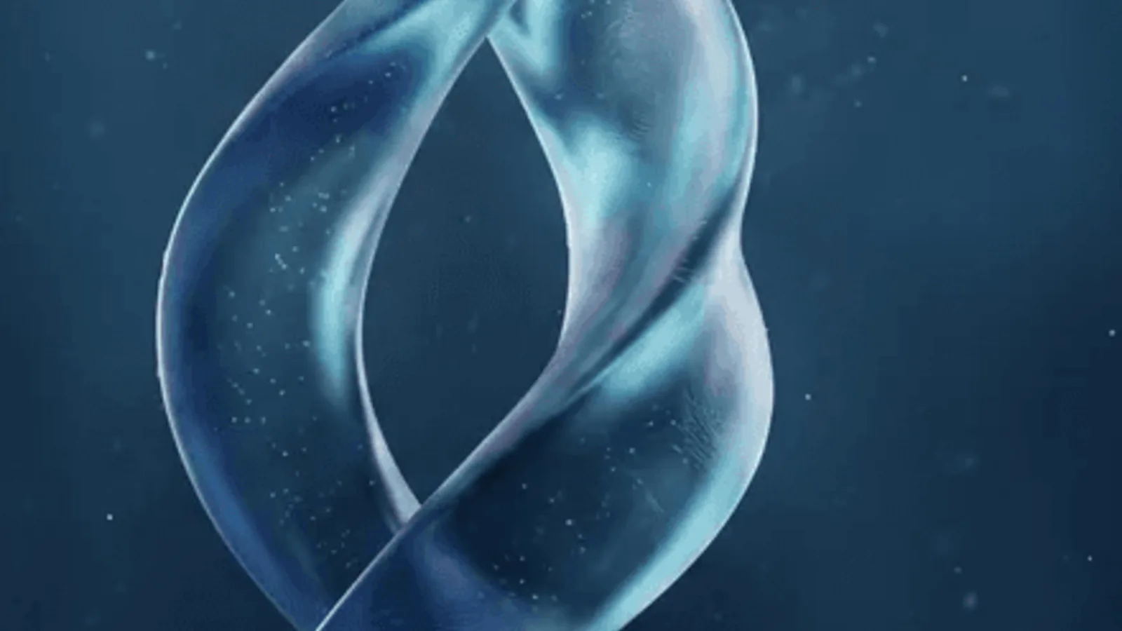 Close-up of a translucent, twisted glass ribbon against a dark blue background.