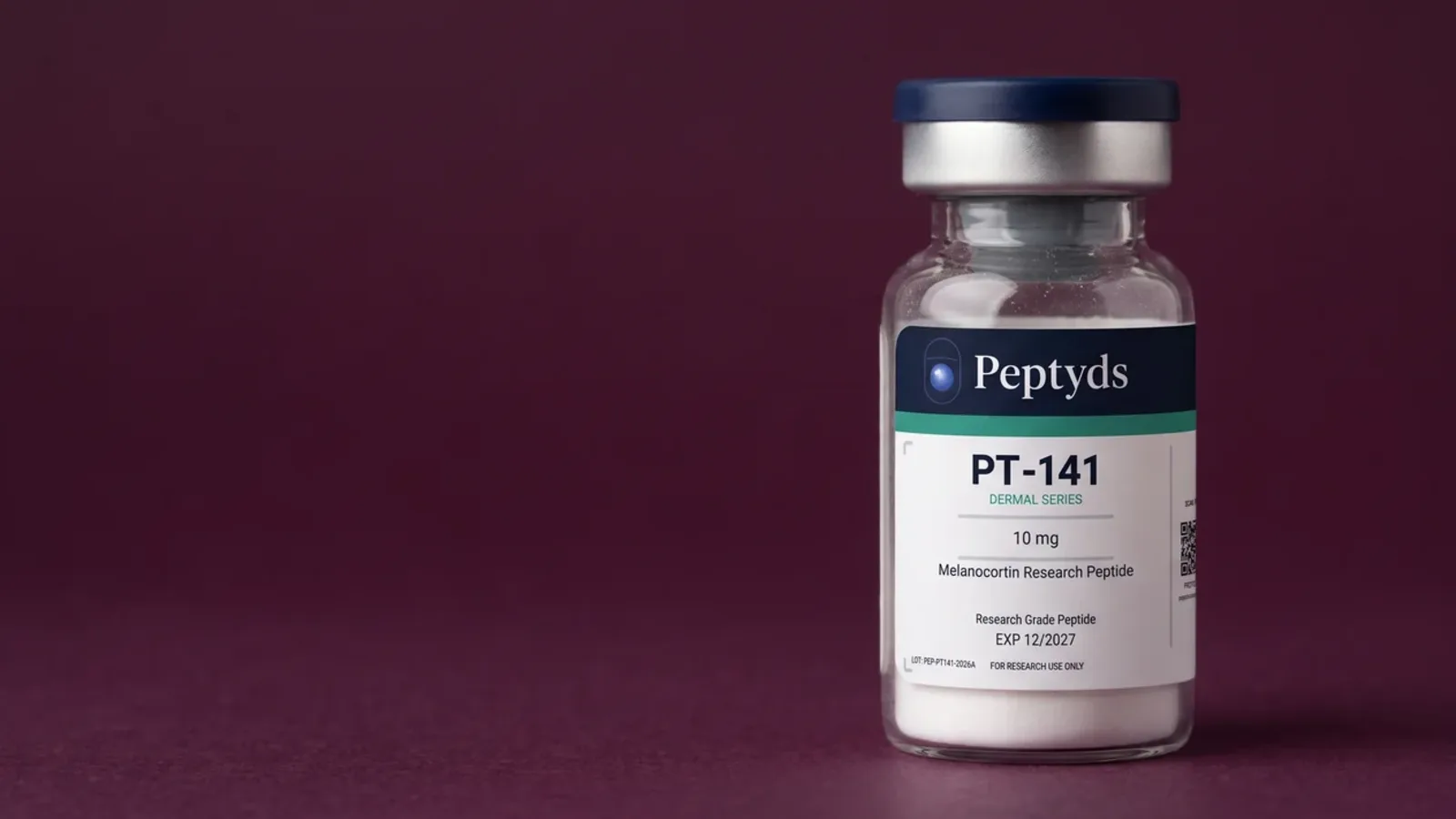 A sealed Peptyds PT-141 research vial standing against a deep plum studio background.